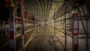 site, scaffolding, rods, tunnel, sidewalk, shut off, night, lights, evening, metal, steel, scaffold, brown night, brown metal, scaffolding, scaffolding, scaffolding, scaffolding, scaffolding, scaffold, scaffold